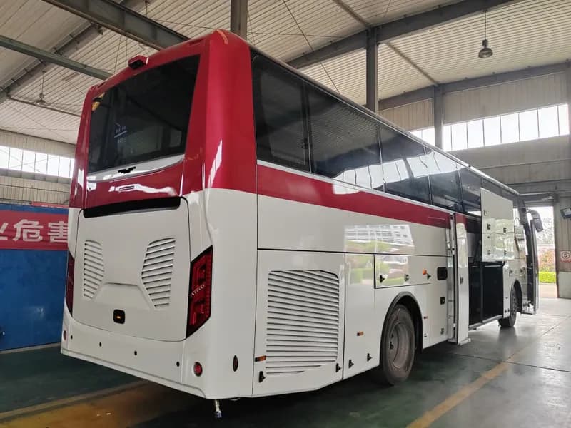 Rear-right with passenger door and luggage bay open