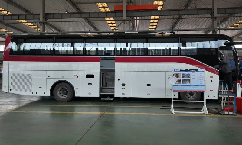 Finished coach side profile on assembly line with open door