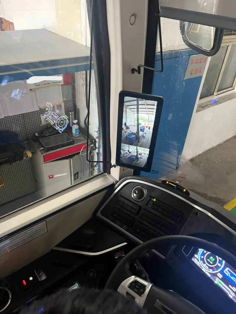 Driver cockpit with digital side-view mirror and instrument cluster