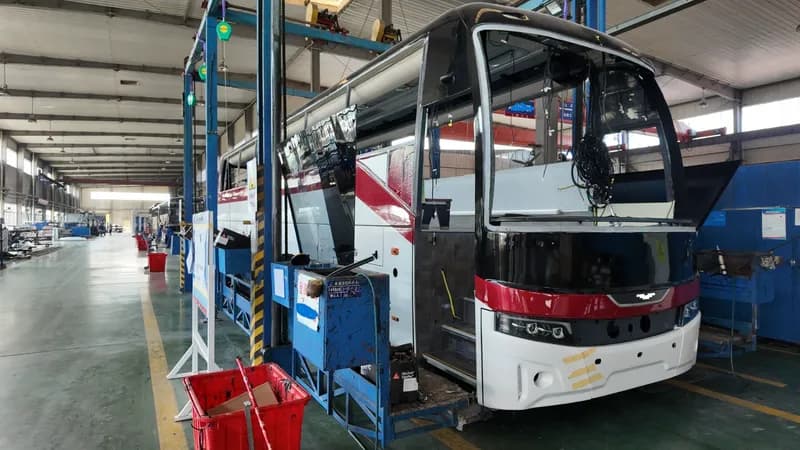 BLK coach front assembly with windshield opening and wiring exposed